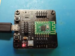Electronic module with microcontroller and USB connector on test board