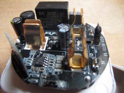 Interior of Smart Plug with FL-S138-V2.0 Board Interior of a smart plug showing the circuit board and components.