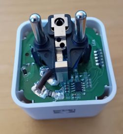 Interior of Smart Plug with Connected Wires Interior view of a smart plug with connected wires.