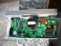 Oznaczenie optotriaka na płytce mc2100e rev c w bieżni Domyoss