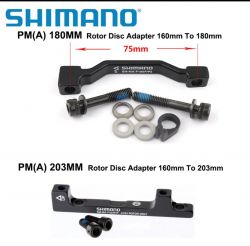 Dwa adaptery tarczowe Shimano do rotorów: jeden z 160 mm na 180 mm, drugi z 160 mm na 203 mm.