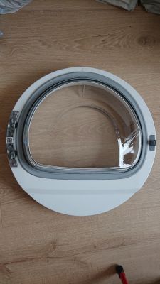 Suszarka Siemens WT45H25EPL - wymiana osłony szyby drzwi