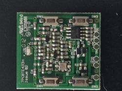 Płytka PCB z pilotem 433 MHz Genius Echo XT4 RC z widocznymi przyciskami i punktami testowymi