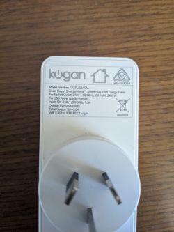 Kogan SmarterHome Smart Plug with Energy Meter Kogan SmarterHome smart plug with energy meter on a wooden surface