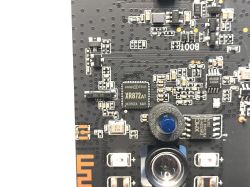 Close-up of PCB with XR872AT chipset and XMC 25QH32CHIG SPI flash