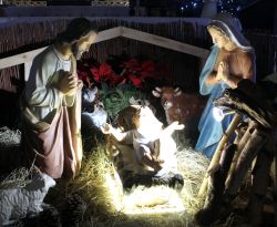 Nativity scene with Joseph, Mary, and baby Jesus in a manger
