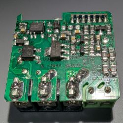 Circuit board with integrated circuits and electronic components.