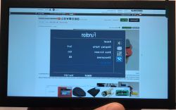 On-screen menu of EM713 display shown upside-down