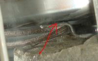 INDESIT WG835TX - Jak zlokalizować wyciek wody przy odważniku?