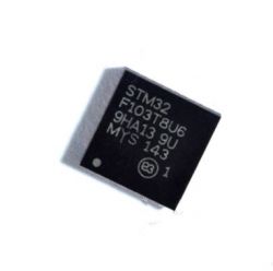 Black STM32F103T8U6 microcontroller with visible markings