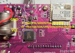 Close-up of a circuit board with Holtek BA45F6746 chip and yellow labels for GND, VCC.