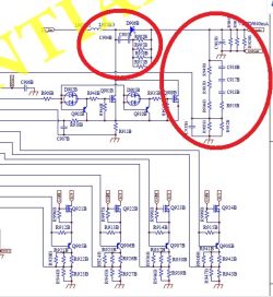 Fragment schematu elektronicznego z podzespołami otoczonymi na czerwono.
