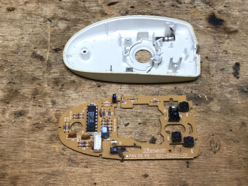 Interior of an Old Computer Mouse Interior of an old computer mouse with a circuit board.