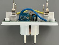 Inside of an Electrical Socket View of the inside of an electrical socket showing wires and electronic components.