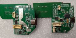 Dwie płytki PCB z jump startera Baseus model CGNL020001 rev. 2.01 z widocznymi złączami, elementami SMD i oznaczeniami.