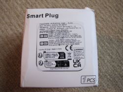 Smart Plug with Energy Metering Packaging Smart plug packaging with manufacturer details.