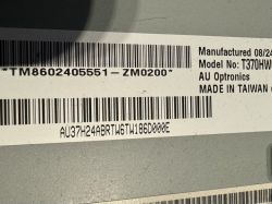 Etykieta z kodami kreskowymi i informacjami o produkcie.
