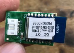 WBR3 WiFi module on PCB with UART connector in close-up view