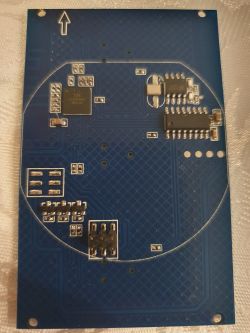 Close-up of a printed circuit board with several electronic components.