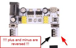 Electronic module with highlighted reversed power supply polarity.