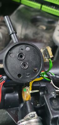 Car Pump Components with Wires Close-up of car pump components with visible wires and O-rings.