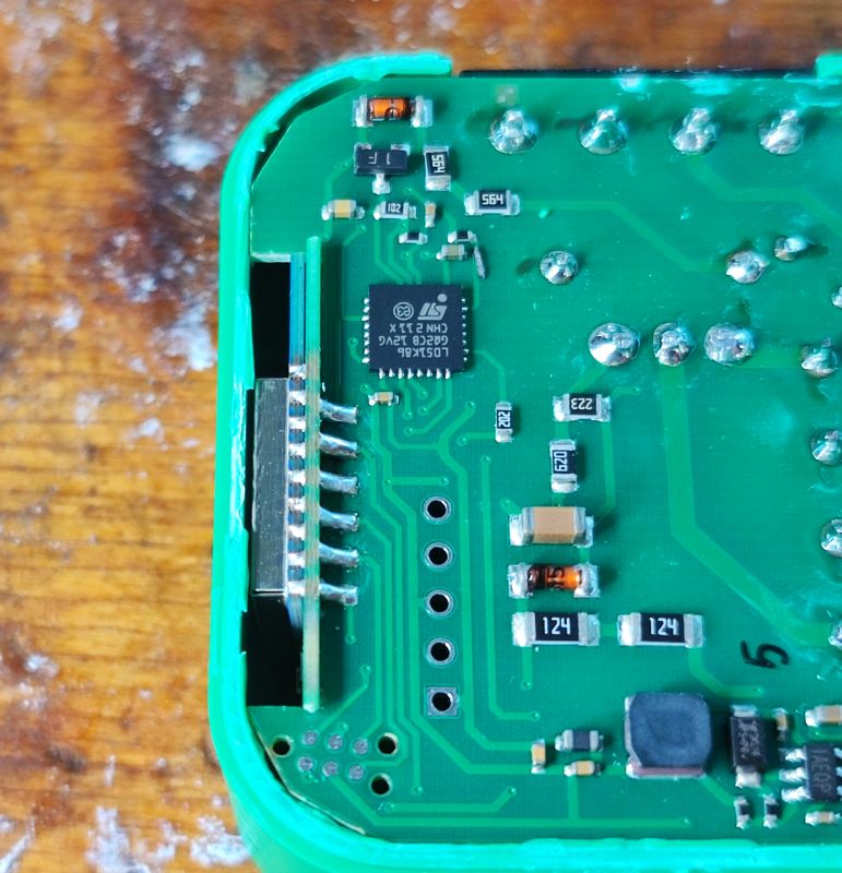 Close-up of DIW-01 Dimmer PCB Close-up of a PCB with electronic components.
