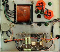 Inside of Rochar A.1335 voltmeter showing transformer and hand-soldered components