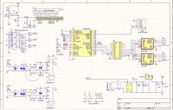 Schemat elektroniczny z mikrokontrolerem, rezystorami, kondensatorami i innymi komponentami, na którym zaznaczony jest rezystor w czerwonym kółku.