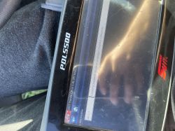 Diagnostyczne urządzenie pokazujące błąd czujnika uderzeniowego w Hondzie FR-V