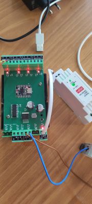 Electronic module with power supply and red indicator LEDs turned on