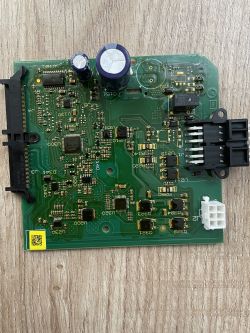Close-up of a circuit board from a Peugeot 3008 electronic module.