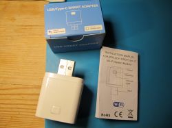 USB Smart adapter with instruction manual.