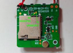PCB with microSD Slot and UART RX/TX Pins PCB with a microSD card slot and labeled UART RX/TX connection points.