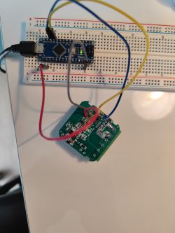 Arduino Nano connected to a PCB on a breadboard.