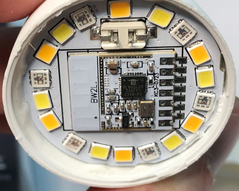 Interior of a smart LED bulb with visible diodes and electronic components.