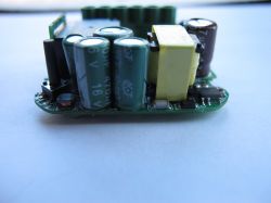 Electronic Switch Module with Capacitors Close-up of an electronic switch module with capacitors and a coil.