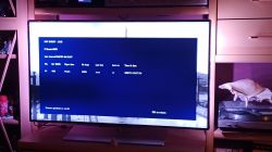 Wyświetlacz telewizora z zaciemnioną lewą stroną i widocznym błędem HW EVENT - LOG.