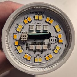 Interior of a smart bulb showing LEDs and a circuit board.