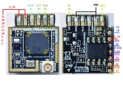 Close-up of two printed circuit boards with pin markings.