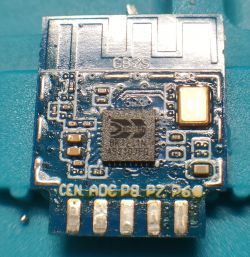 Board with BK7231N Chip Circuit board with a chip labeled BK7231N on a blue background.