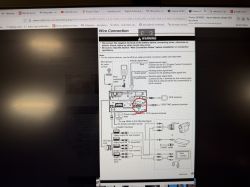 Photo of a screen showing a “Wire Connection” diagram with a red circle marking the CCD camera terminal
