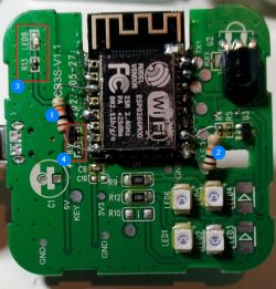 Circuit Board with ESP-12F Module Circuit board with ESP-12F module and component labels.