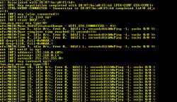 Console with yellow text on black background showing Wi-Fi connection logs for an embedded device.