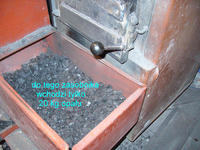 Podajnik szufladowy/tłokowy pieca węglowego