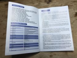 Open retro console manual showing game folders list and key shortcut descriptions