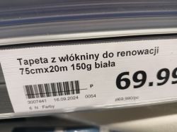 Etykieta z ceną tapety z włókniny do renowacji, rozmiar 75cmx20m, 150g, biała, za 69.99 zł.