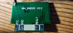 WH_RXD05 V0.2 Module WH_RXD05 V0.2 module on a wooden surface.