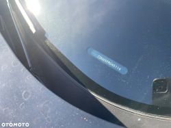 Vehicle VIN number visible through the windshield near the wiper