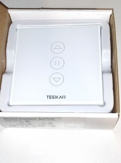 TEEPAO WI-FI Curtain Switch in Packaging TEEPAO WI-FI curtain switch with three buttons in a box.
