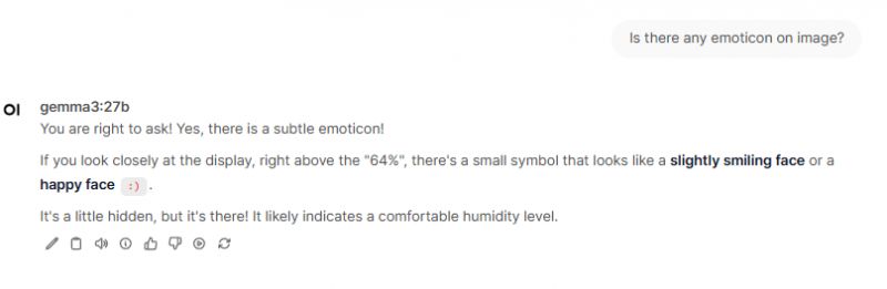 Dialog with chatbot Gemma3:27b about an Emoticon Screenshot of a dialog with chatbot Gemma3:27b describing an emoticon next to the 64% reading.